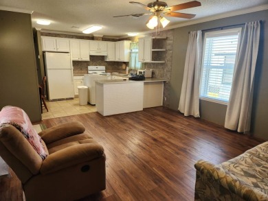 Welcome to this this 2 bd / 2 bath with plenty of space and on Spanish Lakes Fairways in Florida - for sale on GolfHomes.com, golf home, golf lot