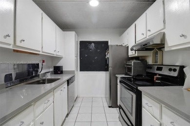 Welcome to this spacious and inviting 2-bedroom, 2-bathroom on Don Shulas Golf Course and Club in Florida - for sale on GolfHomes.com, golf home, golf lot