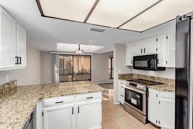 This beautifully refreshed 3-bedroom home in Leisure World, is on Coyote Run Golf Course in Arizona - for sale on GolfHomes.com, golf home, golf lot