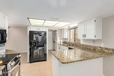 This beautifully refreshed 3-bedroom home in Leisure World, is on Coyote Run Golf Course in Arizona - for sale on GolfHomes.com, golf home, golf lot