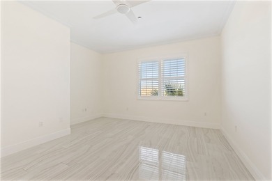 TASTEFULLY RENOVATED TOP FLOOR CORNER CONDO IN MAYFAIR HOUSE on Oak Harbor Country Club in Florida - for sale on GolfHomes.com, golf home, golf lot