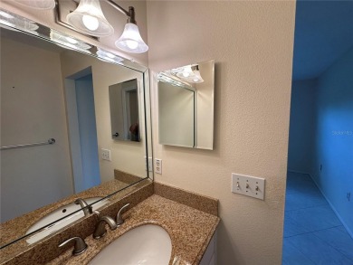 Enjoy the ease of maintenance-free living in this charming and on Beacon Woods Golf Club in Florida - for sale on GolfHomes.com, golf home, golf lot