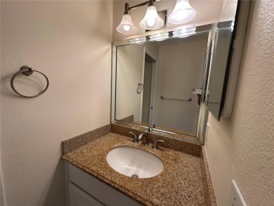 Enjoy the ease of maintenance-free living in this charming and on Beacon Woods Golf Club in Florida - for sale on GolfHomes.com, golf home, golf lot