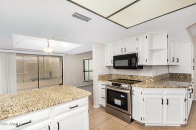 This beautifully refreshed 3-bedroom home in Leisure World, is on Coyote Run Golf Course in Arizona - for sale on GolfHomes.com, golf home, golf lot