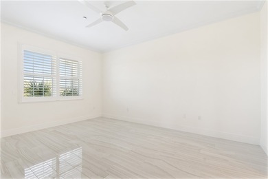 TASTEFULLY RENOVATED TOP FLOOR CORNER CONDO IN MAYFAIR HOUSE on Oak Harbor Country Club in Florida - for sale on GolfHomes.com, golf home, golf lot