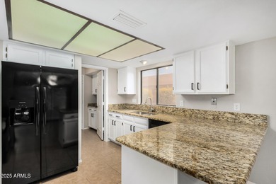 This beautifully refreshed 3-bedroom home in Leisure World, is on Coyote Run Golf Course in Arizona - for sale on GolfHomes.com, golf home, golf lot