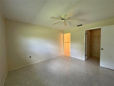Enjoy the ease of maintenance-free living in this charming and on Beacon Woods Golf Club in Florida - for sale on GolfHomes.com, golf home, golf lot