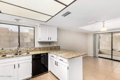 This beautifully refreshed 3-bedroom home in Leisure World, is on Coyote Run Golf Course in Arizona - for sale on GolfHomes.com, golf home, golf lot