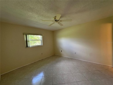 Enjoy the ease of maintenance-free living in this charming and on Beacon Woods Golf Club in Florida - for sale on GolfHomes.com, golf home, golf lot