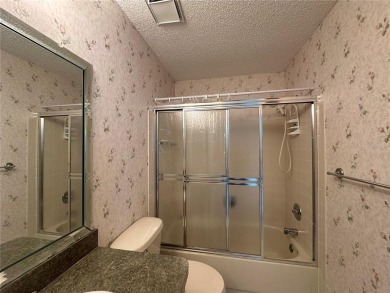 Enjoy the ease of maintenance-free living in this charming and on Beacon Woods Golf Club in Florida - for sale on GolfHomes.com, golf home, golf lot