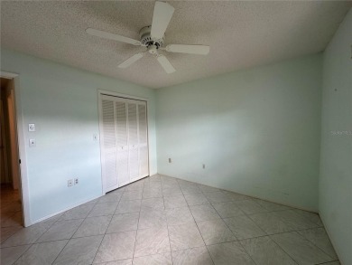 Enjoy the ease of maintenance-free living in this charming and on Beacon Woods Golf Club in Florida - for sale on GolfHomes.com, golf home, golf lot