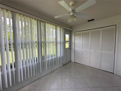Enjoy the ease of maintenance-free living in this charming and on Beacon Woods Golf Club in Florida - for sale on GolfHomes.com, golf home, golf lot