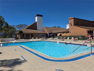 Enjoy the ease of maintenance-free living in this charming and on Beacon Woods Golf Club in Florida - for sale on GolfHomes.com, golf home, golf lot