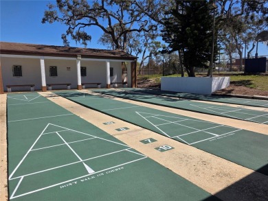 Enjoy the ease of maintenance-free living in this charming and on Beacon Woods Golf Club in Florida - for sale on GolfHomes.com, golf home, golf lot