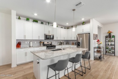 This exceptional Verrado home showcases meticulous pride of on Verrado Golf Club - Victory in Arizona - for sale on GolfHomes.com, golf home, golf lot