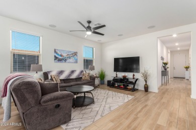 This exceptional Verrado home showcases meticulous pride of on Verrado Golf Club - Victory in Arizona - for sale on GolfHomes.com, golf home, golf lot
