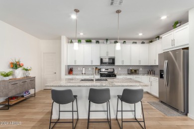 This exceptional Verrado home showcases meticulous pride of on Verrado Golf Club - Victory in Arizona - for sale on GolfHomes.com, golf home, golf lot