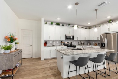 This exceptional Verrado home showcases meticulous pride of on Verrado Golf Club - Victory in Arizona - for sale on GolfHomes.com, golf home, golf lot