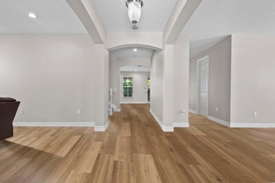 Versatile 4-br, 3-ba Abacoa residence with sparkling LAKE VIEWS on The Club At Admirals Cove Golf Village in Florida - for sale on GolfHomes.com, golf home, golf lot