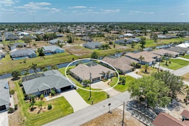 Waterfront Living in Rotonda West Nestled in the serene and on Pinemoor West Golf Club in Florida - for sale on GolfHomes.com, golf home, golf lot