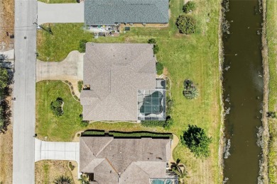 Waterfront Living in Rotonda West Nestled in the serene and on Pinemoor West Golf Club in Florida - for sale on GolfHomes.com, golf home, golf lot