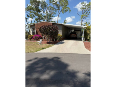 THIS LOVELY, MANUFACTURED HOME ON LEASED LAND.  PRICED TO SELL on Pine Lakes Country Club in Florida - for sale on GolfHomes.com, golf home, golf lot