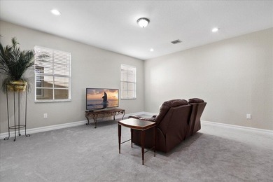 Versatile 4-bedroom, 3-bath Abacoa residence with sparkling LAKE on The Club At Admirals Cove Golf Village in Florida - for sale on GolfHomes.com, golf home, golf lot