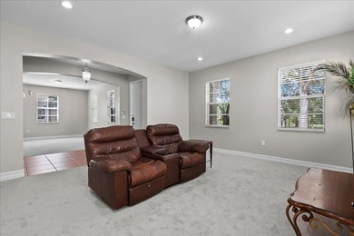 Versatile 4-bedroom, 3-bath Abacoa residence with sparkling LAKE on The Club At Admirals Cove Golf Village in Florida - for sale on GolfHomes.com, golf home, golf lot