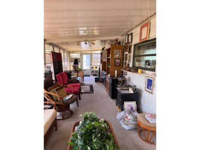 THIS LOVELY, MANUFACTURED HOME ON LEASED LAND.  PRICED TO SELL on Pine Lakes Country Club in Florida - for sale on GolfHomes.com, golf home, golf lot