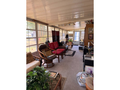 THIS LOVELY, MANUFACTURED HOME ON LEASED LAND.  PRICED TO SELL on Pine Lakes Country Club in Florida - for sale on GolfHomes.com, golf home, golf lot