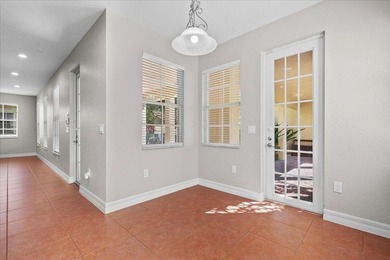 Versatile 4-br, 3-ba Abacoa residence with sparkling LAKE VIEWS on The Club At Admirals Cove Golf Village in Florida - for sale on GolfHomes.com, golf home, golf lot