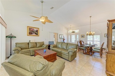 Waterfront Living in Rotonda West Nestled in the serene and on Pinemoor West Golf Club in Florida - for sale on GolfHomes.com, golf home, golf lot