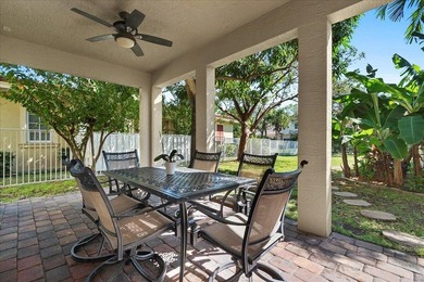 Versatile 4-br, 3-ba Abacoa residence with sparkling LAKE VIEWS on The Club At Admirals Cove Golf Village in Florida - for sale on GolfHomes.com, golf home, golf lot