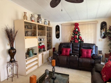 THIS LOVELY, MANUFACTURED HOME ON LEASED LAND.  PRICED TO SELL on Pine Lakes Country Club in Florida - for sale on GolfHomes.com, golf home, golf lot