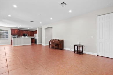 Versatile 4-bedroom, 3-bath Abacoa residence with sparkling LAKE on The Club At Admirals Cove Golf Village in Florida - for sale on GolfHomes.com, golf home, golf lot