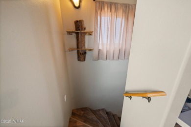 Unique Home nestled on 2 lots in White Mountain Lakes! Lake on Silver Creek Golf Club in Arizona - for sale on GolfHomes.com, golf home, golf lot