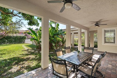 Versatile 4-bedroom, 3-bath Abacoa residence with sparkling LAKE on The Club At Admirals Cove Golf Village in Florida - for sale on GolfHomes.com, golf home, golf lot