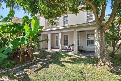 Versatile 4-bedroom, 3-bath Abacoa residence with sparkling LAKE on The Club At Admirals Cove Golf Village in Florida - for sale on GolfHomes.com, golf home, golf lot