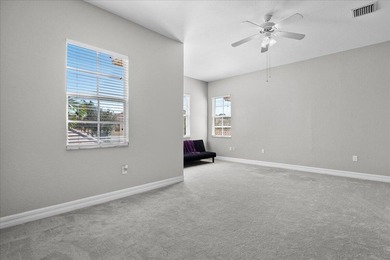 Versatile 4-bedroom, 3-bath Abacoa residence with sparkling LAKE on The Club At Admirals Cove Golf Village in Florida - for sale on GolfHomes.com, golf home, golf lot