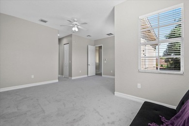 Versatile 4-bedroom, 3-bath Abacoa residence with sparkling LAKE on The Club At Admirals Cove Golf Village in Florida - for sale on GolfHomes.com, golf home, golf lot