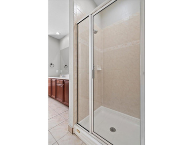 Versatile 4-bedroom, 3-bath Abacoa residence with sparkling LAKE on The Club At Admirals Cove Golf Village in Florida - for sale on GolfHomes.com, golf home, golf lot