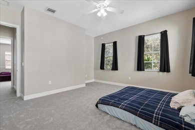 Versatile 4-bedroom, 3-bath Abacoa residence with sparkling LAKE on The Club At Admirals Cove Golf Village in Florida - for sale on GolfHomes.com, golf home, golf lot