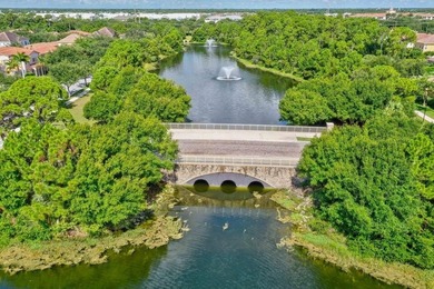 Versatile 4-bedroom, 3-bath Abacoa residence with sparkling LAKE on The Club At Admirals Cove Golf Village in Florida - for sale on GolfHomes.com, golf home, golf lot