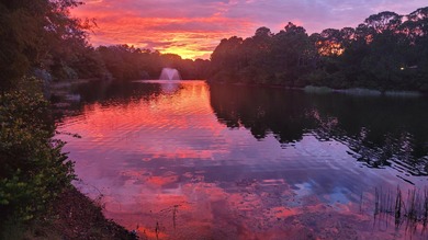 Versatile 4-bedroom, 3-bath Abacoa residence with sparkling LAKE on The Club At Admirals Cove Golf Village in Florida - for sale on GolfHomes.com, golf home, golf lot