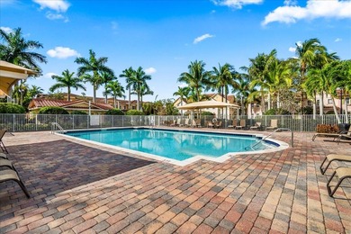 Versatile 4-bedroom, 3-bath Abacoa residence with sparkling LAKE on The Club At Admirals Cove Golf Village in Florida - for sale on GolfHomes.com, golf home, golf lot