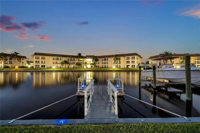 UNOBSTRUCTED GULF ACCESS. PRIVATE BEACH. CUTE AS A BUTTON on Gulf Harbors Golf Course in Florida - for sale on GolfHomes.com, golf home, golf lot