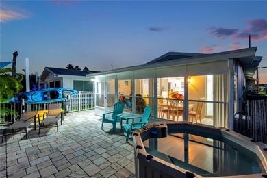 UNOBSTRUCTED GULF ACCESS. PRIVATE BEACH. CUTE AS A BUTTON on Gulf Harbors Golf Course in Florida - for sale on GolfHomes.com, golf home, golf lot