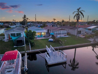 UNOBSTRUCTED GULF ACCESS. PRIVATE BEACH. CUTE AS A BUTTON on Gulf Harbors Golf Course in Florida - for sale on GolfHomes.com, golf home, golf lot