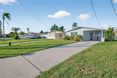 UNOBSTRUCTED GULF ACCESS. PRIVATE BEACH. CUTE AS A BUTTON on Gulf Harbors Golf Course in Florida - for sale on GolfHomes.com, golf home, golf lot