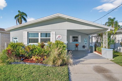 UNOBSTRUCTED GULF ACCESS. PRIVATE BEACH. CUTE AS A BUTTON on Gulf Harbors Golf Course in Florida - for sale on GolfHomes.com, golf home, golf lot